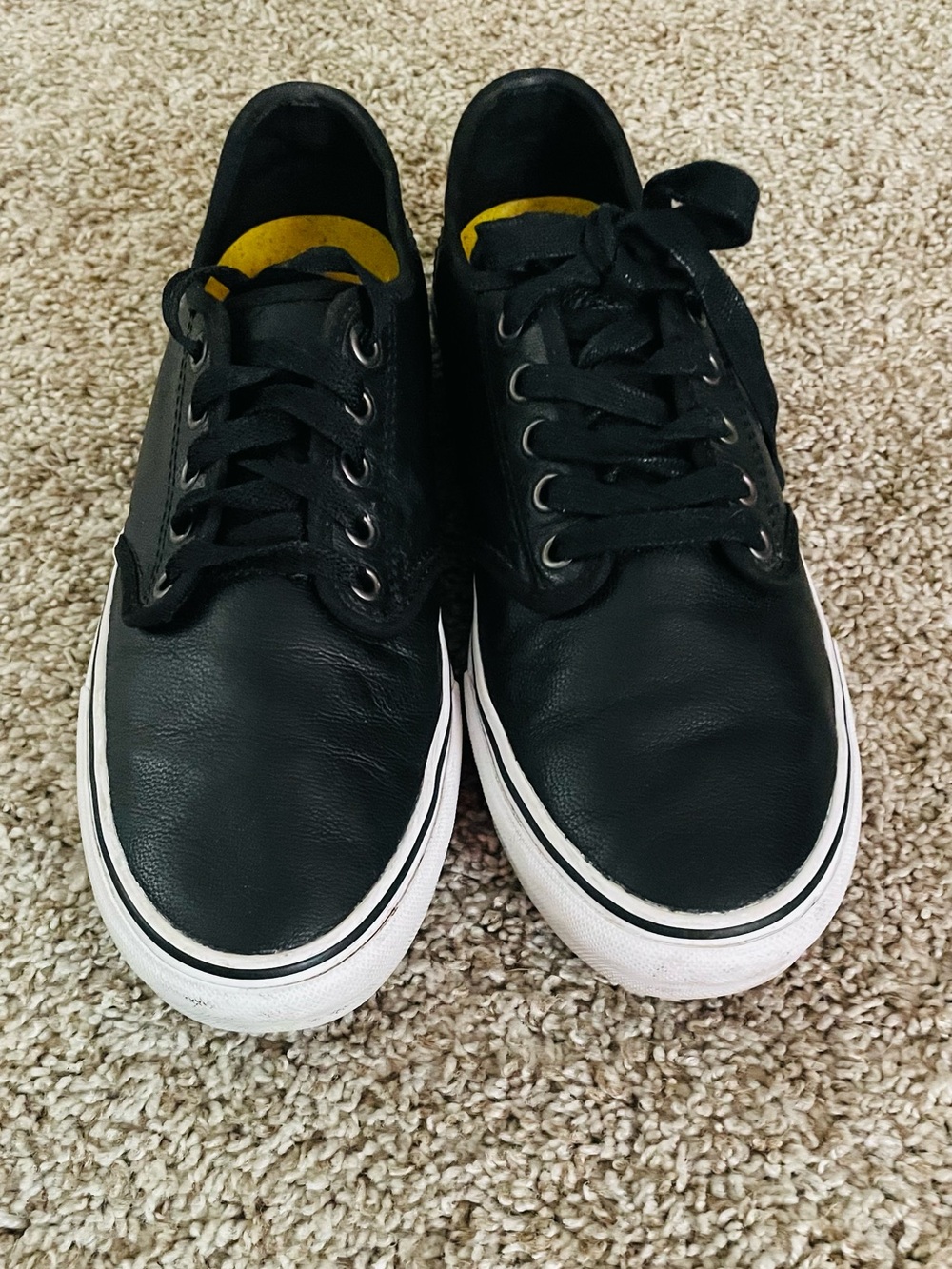Women’s Vans Black Leather Low-Top Sneakers